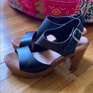 Black real leather platform heeled sandals.